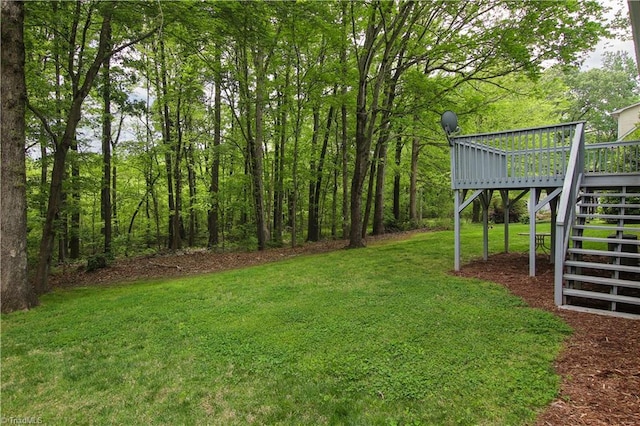 view of yard with a deck