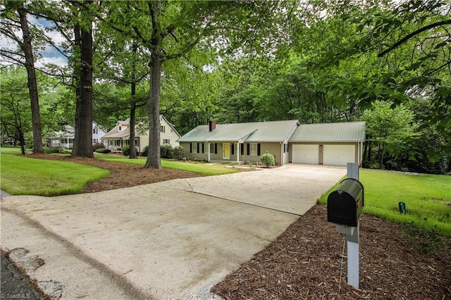 ranch-style house with a front lawn and a garage