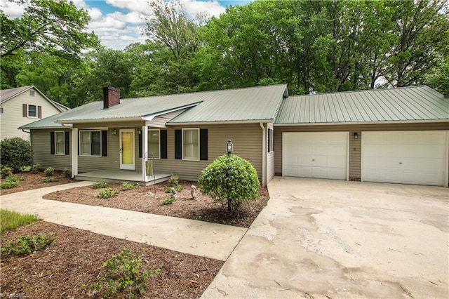 ranch-style house with a garage and a porch