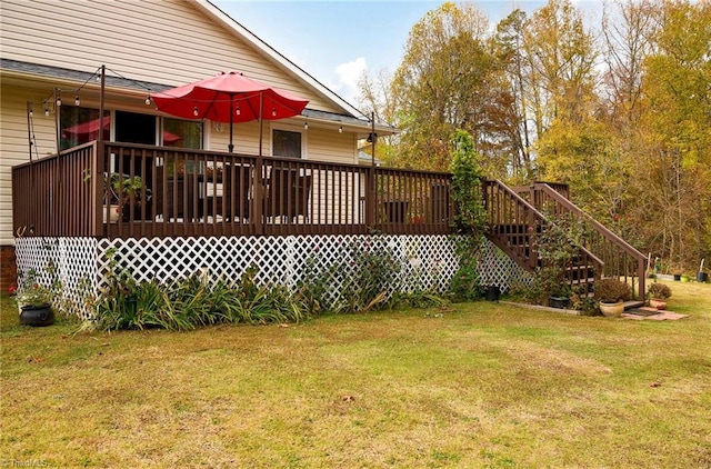 view of yard featuring a wooden deck