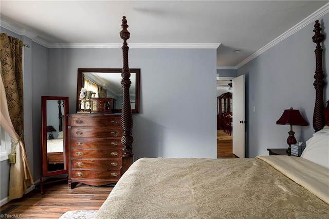 bedroom featuring hardwood / wood-style flooring and ornamental molding