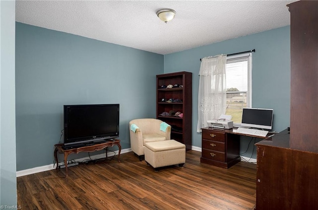 office area featuring a textured ceiling and dark hardwood / wood-style floors