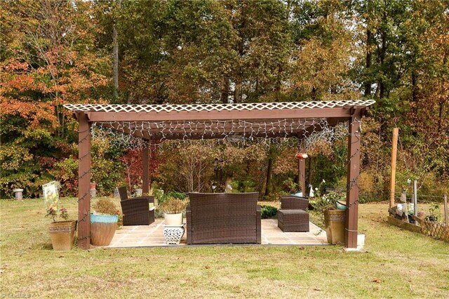 view of home's community with a yard, a pergola, and a patio area