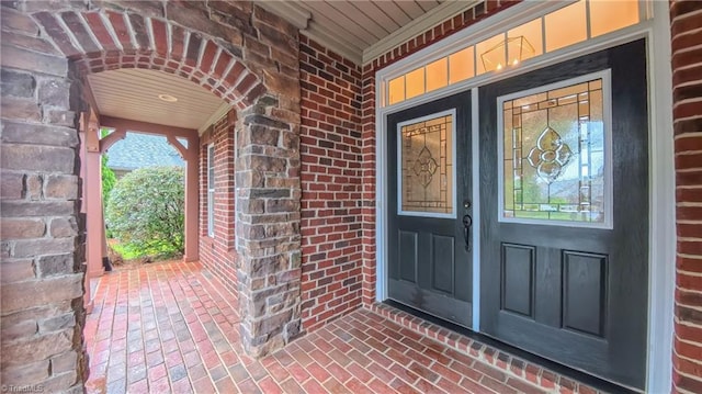5567 Foxgate Cir, Winston-Salem, NC 27106 - property entrance with brick siding and covered porch