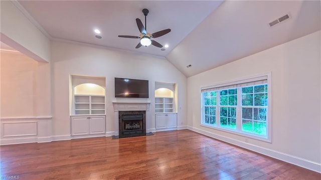 5567 Foxgate Cir, Winston-Salem, NC 27106 - unfurnished living room featuring built in features, ceiling fan, lofted ceiling, wood finished floors, and a fireplace