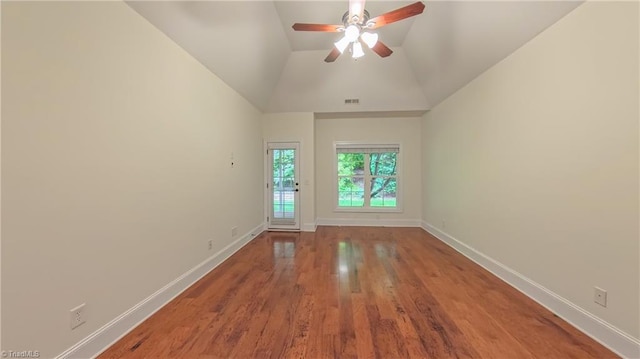 5567 Foxgate Cir, Winston-Salem, NC 27106 - empty room with ceiling fan, wood finished floors, and lofted ceiling