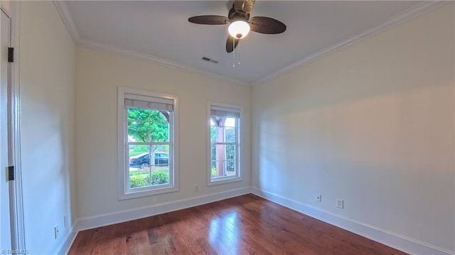5567 Foxgate Cir, Winston-Salem, NC 27106 - spare room with dark wood finished floors, ornamental molding, and ceiling fan