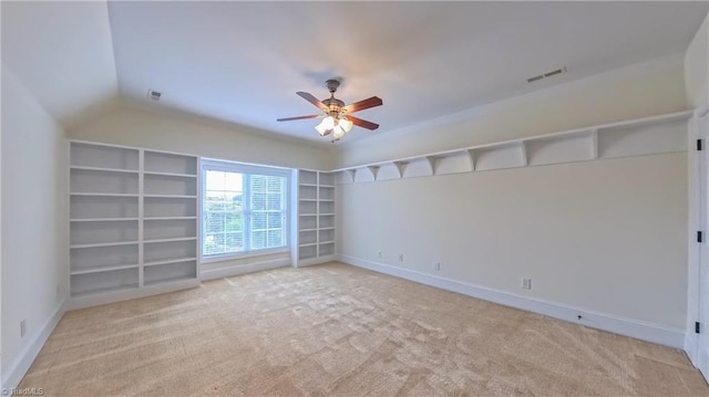 5567 Foxgate Cir, Winston-Salem, NC 27106 - unfurnished room featuring a ceiling fan, light colored carpet, and built in shelves