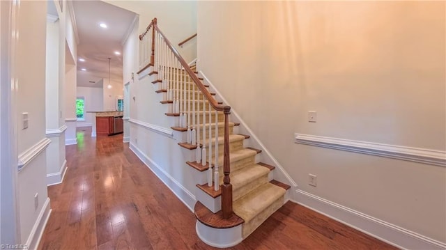 5567 Foxgate Cir, Winston-Salem, NC 27106 - stairs featuring hardwood / wood-style floors and recessed lighting
