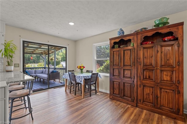 2664 Old Thomasville Rd, Winston-Salem, NC 27107 - dining room with light wood-style floors, a textured ceiling, and recessed lighting