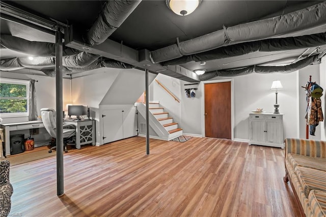 2664 Old Thomasville Rd, Winston-Salem, NC 27107 - basement featuring wood finished floors, stairs, and a desk