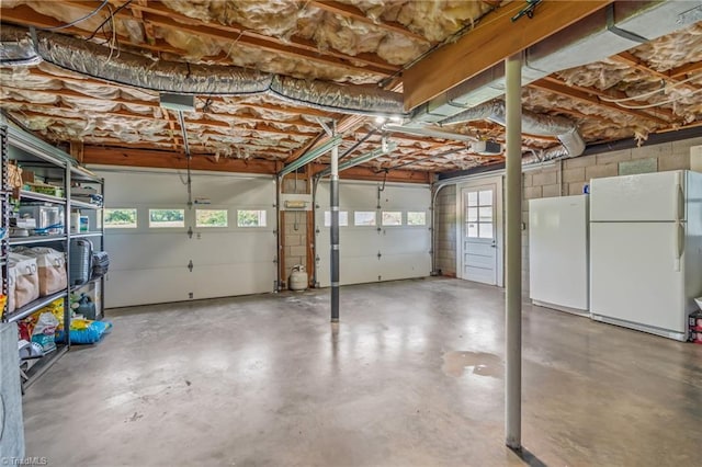 2664 Old Thomasville Rd, Winston-Salem, NC 27107 - garage featuring freestanding refrigerator