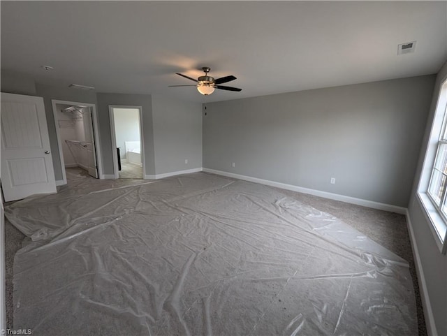 spare room with ceiling fan