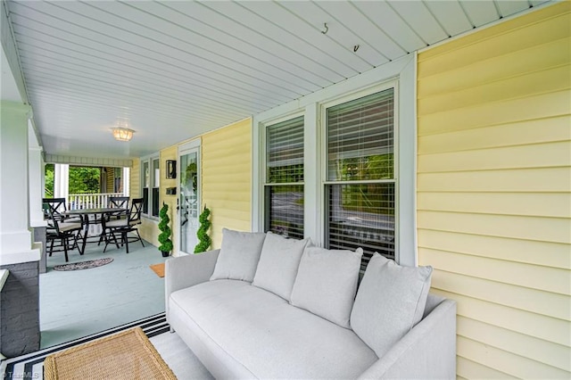 view of patio / terrace with a porch and outdoor lounge area