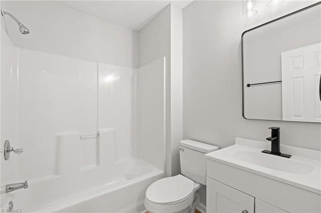 full bathroom featuring vanity, shower / bathtub combination, and toilet