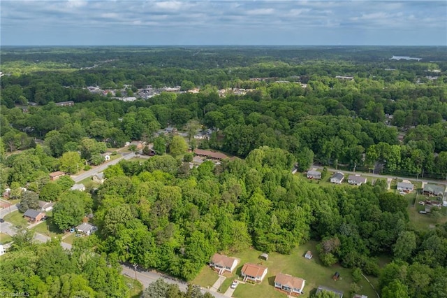 bird's eye view with a view of trees