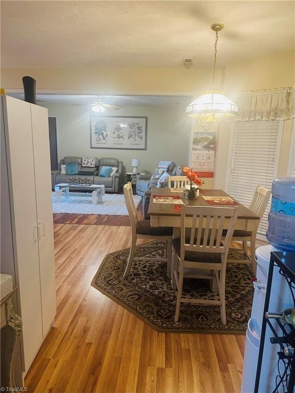 dining area featuring light wood-type flooring