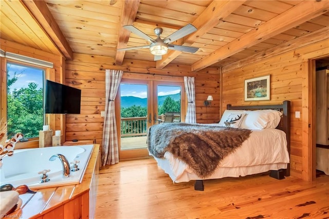 bedroom featuring access to exterior, wood ceiling, and beam ceiling