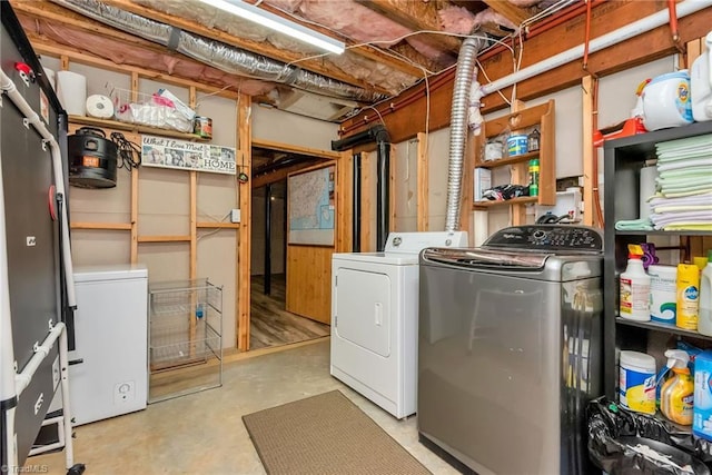 laundry room featuring laundry area and washing machine and dryer