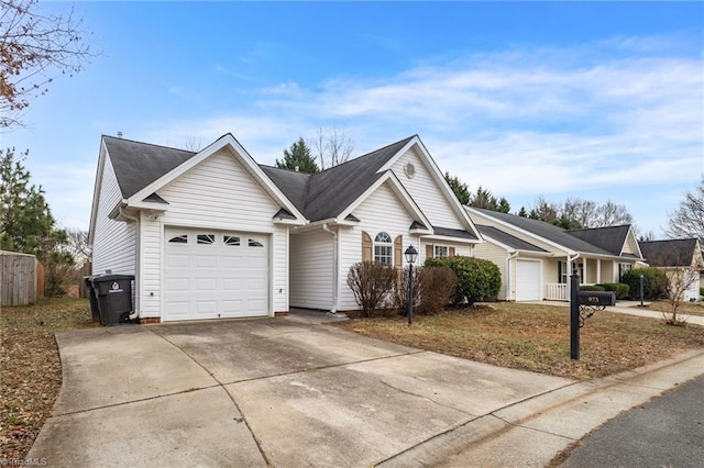 ranch-style house featuring a garage