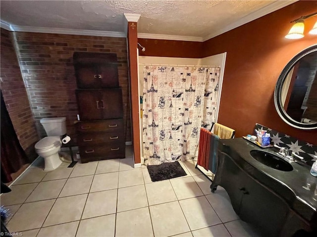 bathroom with toilet, a textured ceiling, ornamental molding, vanity, and tile patterned flooring