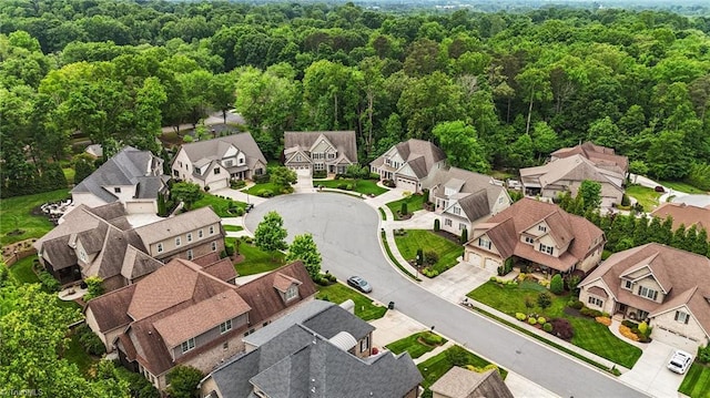 birds eye view of property with a residential view