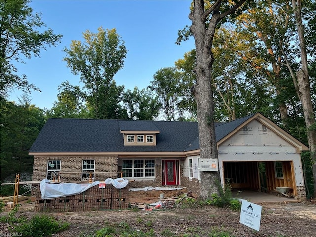 3710 Keith St, Greensboro, NC 27405 - view of front of home with an attached garage and brick siding