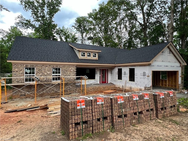 3710 Keith St, Greensboro, NC 27405 - property under construction featuring an attached garage and roof with shingles