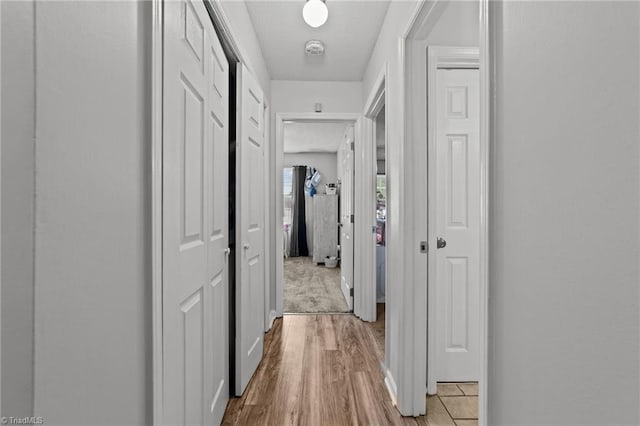 corridor featuring light hardwood / wood-style flooring