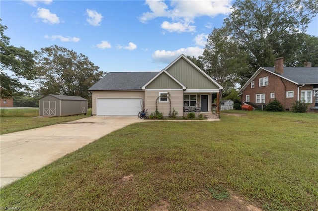 view of front of property with a garage, a front lawn, and covered porch