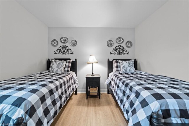 bedroom featuring light hardwood / wood-style floors