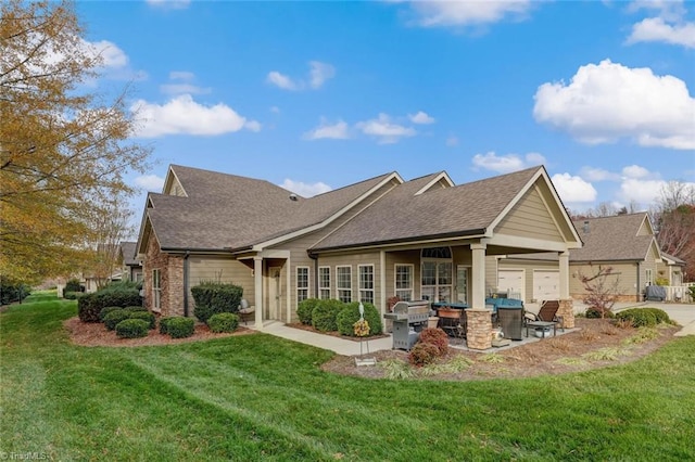 rear view of property with a patio area and a yard