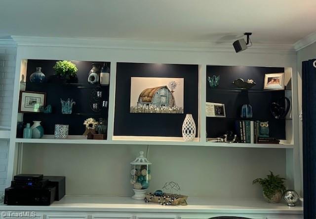 bar featuring crown molding