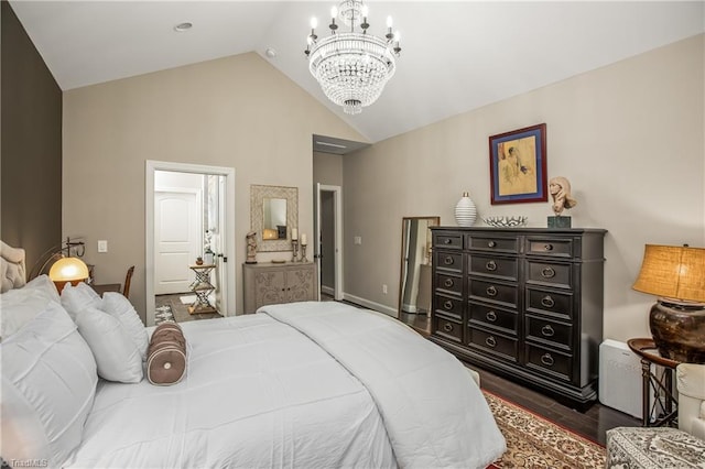 bedroom with an inviting chandelier, vaulted ceiling, and dark wood finished floors