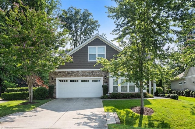 5905 Knowledge Dr, Clemmons, NC 27012 - craftsman-style home with driveway, stone siding, a front lawn, and an attached garage