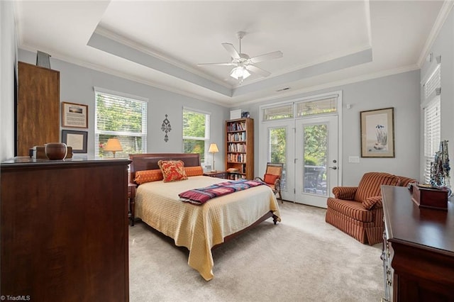 5905 Knowledge Dr, Clemmons, NC 27012 - bedroom with a tray ceiling, crown molding, access to outside, light colored carpet, and a ceiling fan