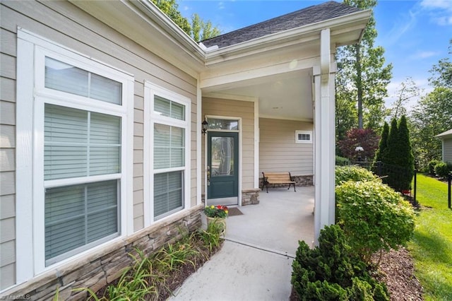 5905 Knowledge Dr, Clemmons, NC 27012 - entrance to property with stone siding and a shingled roof