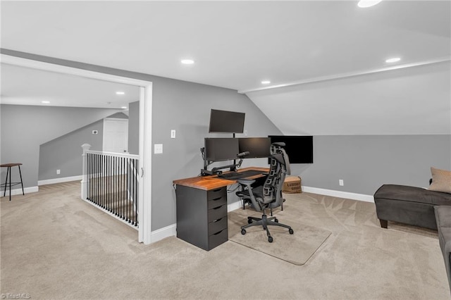 carpeted office space with recessed lighting, baseboards, and vaulted ceiling