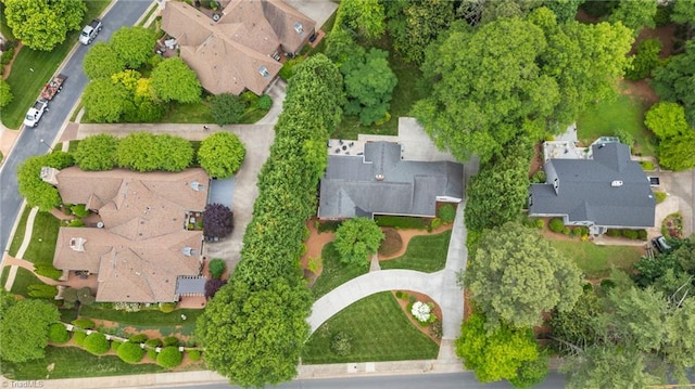 aerial view of property's location with nearby suburban area