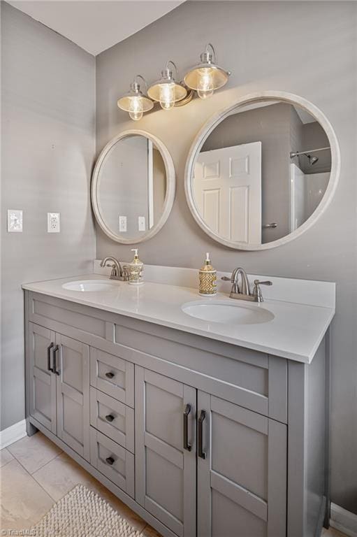 bathroom with vanity and tile patterned flooring