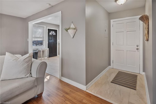 foyer with hardwood / wood-style flooring