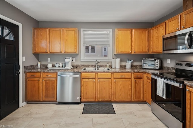 kitchen with stainless steel appliances and sink