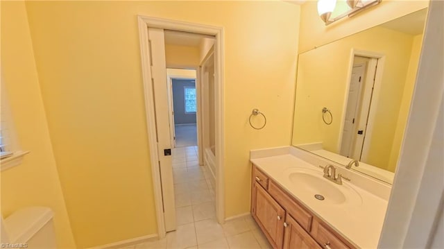 1005 Fallbrook Ln, Lewisville, NC 27023 - bathroom featuring tile patterned flooring, vanity, toilet, and baseboards