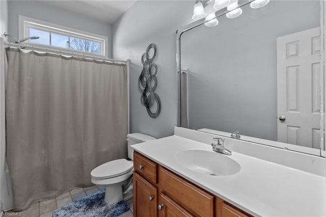 full bathroom featuring toilet, a shower with curtain, tile patterned flooring, and vanity