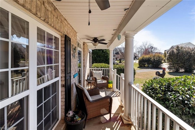 balcony featuring ceiling fan