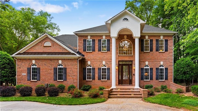 344 Lake Point Ln, Belews Creek, NC 27009 - greek revival inspired property with brick siding