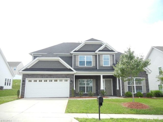 715 Cannonade Dr, Whitsett, NC 27377 - craftsman inspired home featuring driveway and a front yard
