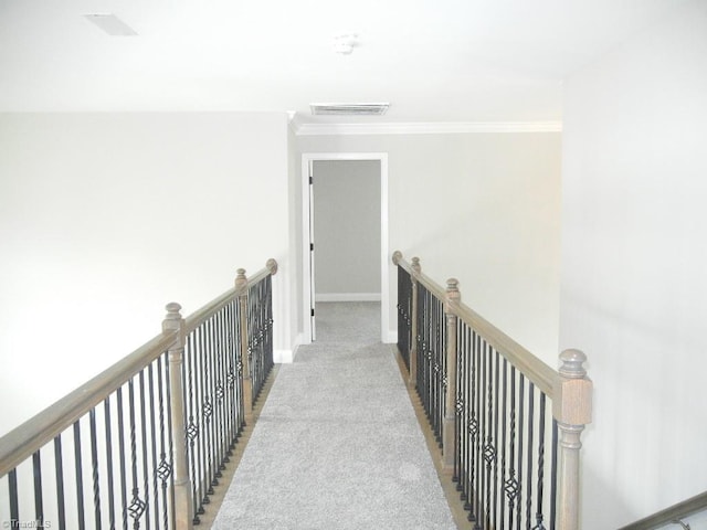715 Cannonade Dr, Whitsett, NC 27377 - corridor featuring an upstairs landing, carpet floors, and ornamental molding