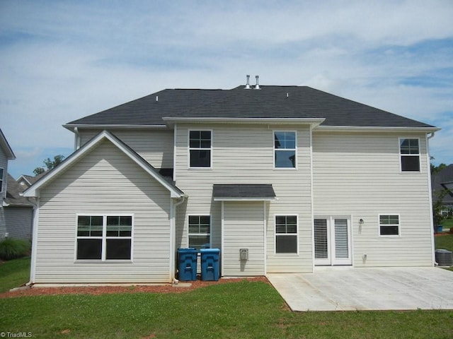 715 Cannonade Dr, Whitsett, NC 27377 - back of property featuring a patio and a lawn