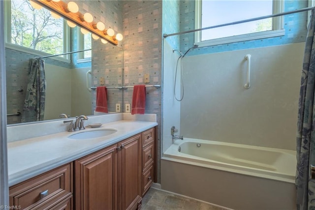 full bathroom with shower / bath combo with shower curtain and vanity